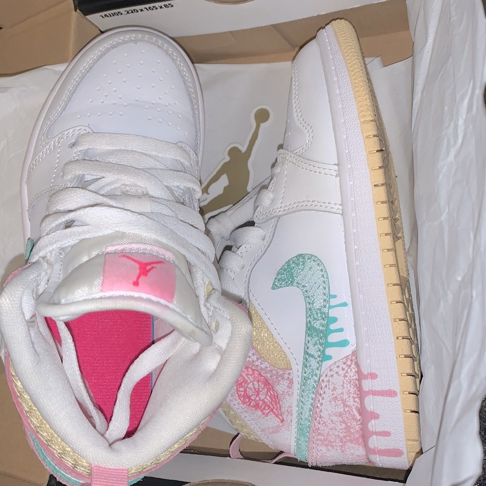 Little girl Jordan sneaker with box.